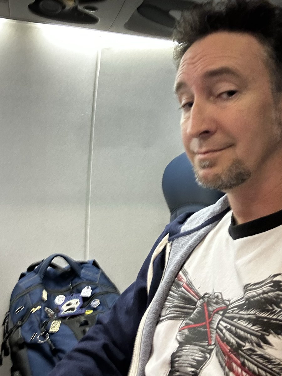 dustinpari's tweet photo. Loving the… view? 
1 cancelled flight.
4 delays.
Last row.
No window.
It has been a day.
One flight left.
Take me home. 👼 https://t.co/I1t5VmaFQT