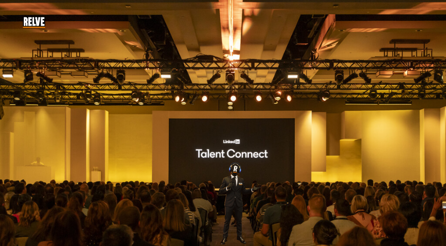 Relve_official's tweet photo. 🚨#RelveEvent: LinkedIn Talent Connect Summit 2026 opens today at the Javits Center, New York, running 28 to 30 September.
📌Explore event details: https://t.co/9ieN2lhrLj
1,000+ senior talent leaders, invitation only, four AI-focused themes:
→ Proving AI's value with a business case
→ Building trust in AI-assisted hiring
→ Workforce readiness and change
→ Putting AI to work day to day
@LinkedIn CEO Dan Shapero headlines, with Brené Brown, astronaut Leland Melvin and @Cisco 's @Scott McGuckin.
The question moved from which tool to how you defend the outcome.
The free Talent Connect Show streams the mainstage.