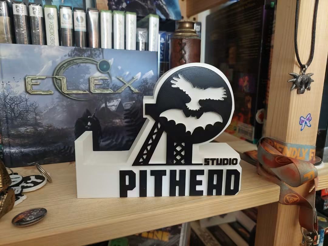 PitheadStudio's tweet photo. Cralon ⚒️🦉🦇 Community Corner

Anja and Marco from @DinoshopN59860 printed our studio logo for us and it also has a special place on our nerd shelf.

#pitheadstudio #indiedev #gamedev #fanart #creative #community https://t.co/HoK3t5lHj1