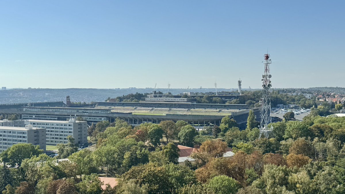 SimonPeach's tweet photo. In Prague for Czechia v England. Spotted a giant stadium so went to check it out. Turns out it was Great Strahov Stadium - a vast venue with a dark history that could hold up to 250,000. Sparta have built their training ground, inc. eight pitches, within the crumbling stands 🏟️🇨🇿 https://t.co/ZExpysGyJo