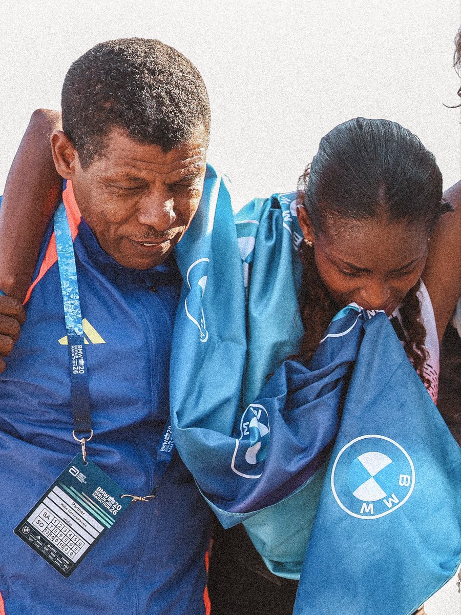 WorldAthletics's tweet photo. This is what it’s all about ❤️‍🩹

After Berlin Marathon’s dramatic finish, a limping Tigst Assefa was held by legend Haile Gebrselassie in an unforgettable emotional moment shared between some of the greatest ever in the marathon. https://t.co/4xKfZMBoGR