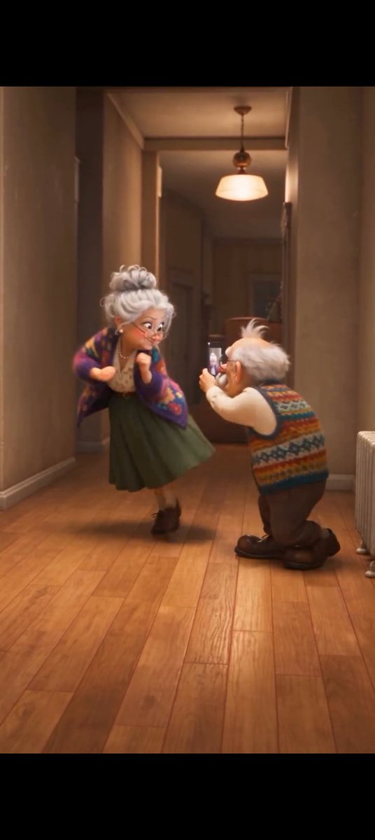 Elderly Couple Hallway Dance
