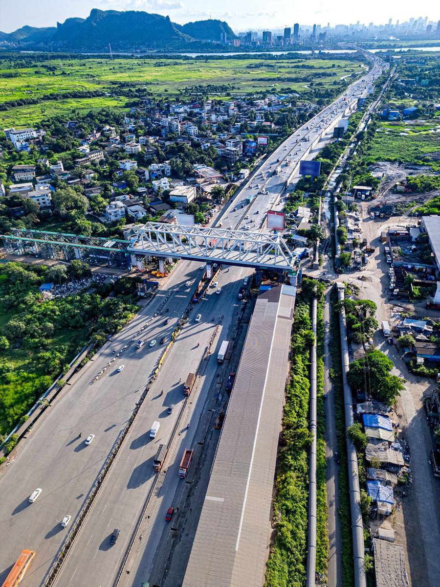 RailMinIndia's tweet photo. A landmark milestone for India’s Bullet Train Project! 🚄🇮🇳

A 100-metre, 1,405 MT steel bridge has been successfully launched over NH-3 at Dive-Anjur, Bhiwandi, the first steel bridge completed for the Mumbai–Ahmedabad Bullet Train Project in Maharashtra.
#BulletTrain https://t.co/U30bK9Hn40