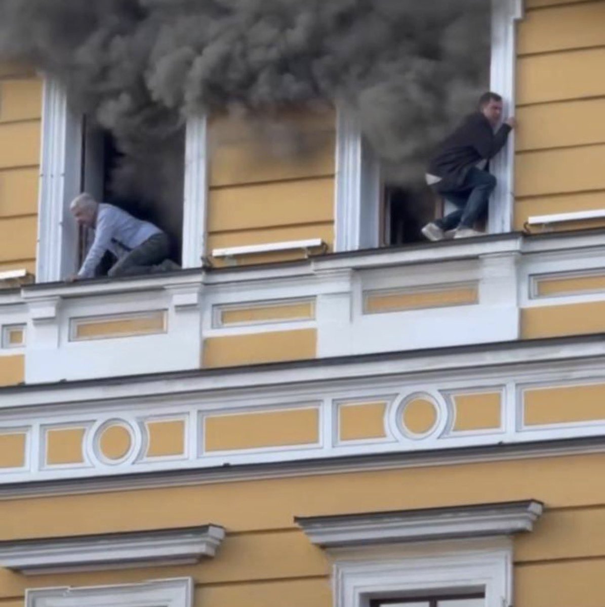 reshetz's tweet photo. People at the Academy of Sciences in Kyiv after a russian drone strike https://t.co/JUkP5022id