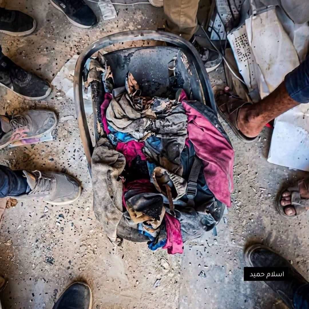 gazanotice's tweet photo. 🚨 HORRIBLE : The skeletal remains of an infant from the Attallah family were recovered two days ago from beneath the rubble of their home, destroyed by Israeli forces during the genocidal war on Gaza.

The baby was in his crib when the bombing struck, with his milk bottle lying beside him.

After all this time, only bones and skeletal remains still inside his clothes were found.