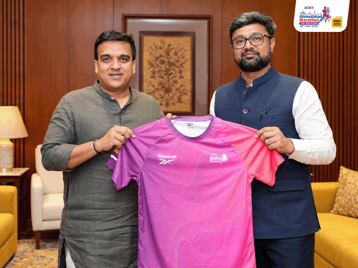 AhmdMarathon's tweet photo. A memorable moment as Sanjay Adesara, Chief Business Officer, Adani Sportsline, met Hon’ble Deputy CM of Gujarat, Shri Harsh Sanghavi 🤝

It also marked the presentation of our latest AAM jersey - a celebration of Ahmedabad’s spirit, energy &amp; its enduring passion for running. https://t.co/a4xHQQRuRs
