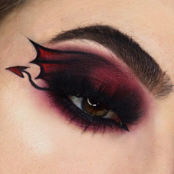 gothicornate_'s tweet photo. dark, dramatic, and unapologetically bold bat makeup https://t.co/J6e4ySfTRB