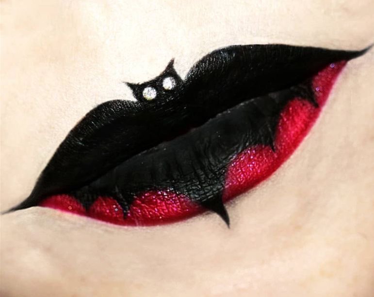 gothicornate_'s tweet photo. dark, dramatic, and unapologetically bold bat makeup https://t.co/J6e4ySfTRB