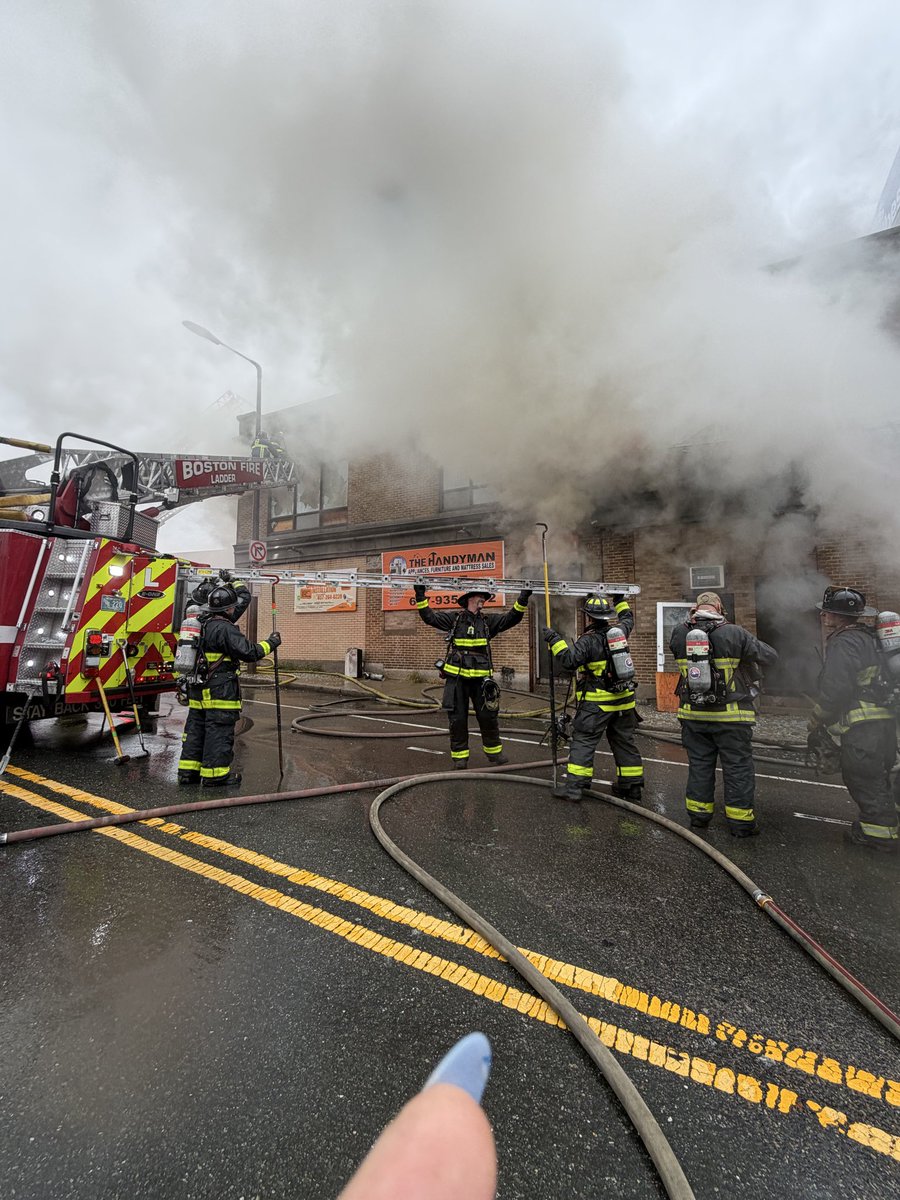 BostonFire's tweet photo. Please avoid the Dudley area of Roxbury. Fire companies have the entire block surrounded with engines pumping to all the trucks with ladder pipes. The 2 story landmark building is now all outside work. https://t.co/KKvwlHZYhr