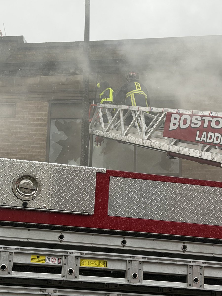 BostonFire's tweet photo. Please avoid the Dudley area of Roxbury. Fire companies have the entire block surrounded with engines pumping to all the trucks with ladder pipes. The 2 story landmark building is now all outside work. https://t.co/KKvwlHZYhr