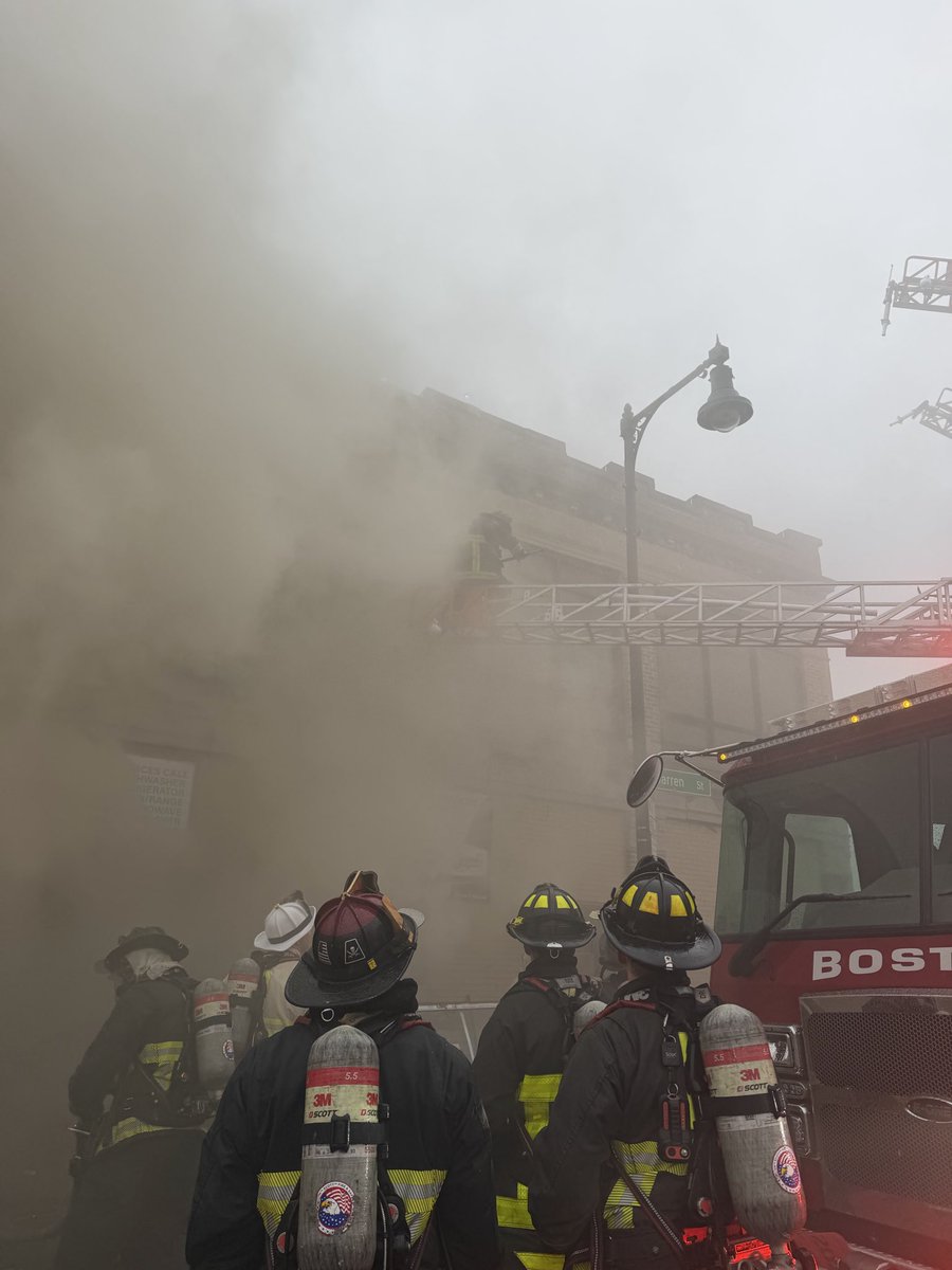 BostonFire's tweet photo. Please avoid the Dudley area of Roxbury. Fire companies have the entire block surrounded with engines pumping to all the trucks with ladder pipes. The 2 story landmark building is now all outside work. https://t.co/KKvwlHZYhr