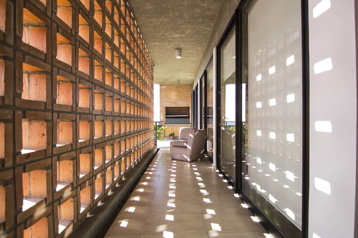 shavnyuyngah's tweet photo. Breeze blocks should be the default in our public buildings. Not because they look cool, but because they cut the running cost.

A wall that lets air through does part of the cooling for free, so the AC works less and the electricity bill drops. Public buildings run all day, so those savings add up fast.

This is the San Francisco Building in Asunción, Paraguay. It cost about $700 per square meter and reuses rainwater for its gardens and sanitary use. Breathing walls, recycled water, and a sane budget.

Kéré is doing it in Dakar. Others are doing it in Paraguay. We keep sealing our public spaces in glass.

Asunción, Paraguay. Architect: José Cubilla. Completed 2014. Photography: Lauro Rocha.