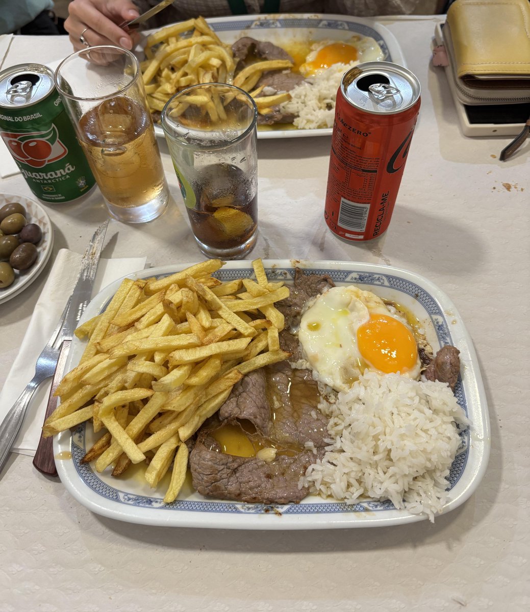 levelsio's tweet photo. The most sold dish is Bitoque

Every meal has fries and rice, imagine having 2 sides of starch/carbs with your protein

The steak is not good, it's thin, overcooked, well done and gray inside

Don't get me started about Francesinha

Pastel da Nata is great yes but it's a snack, it's not food