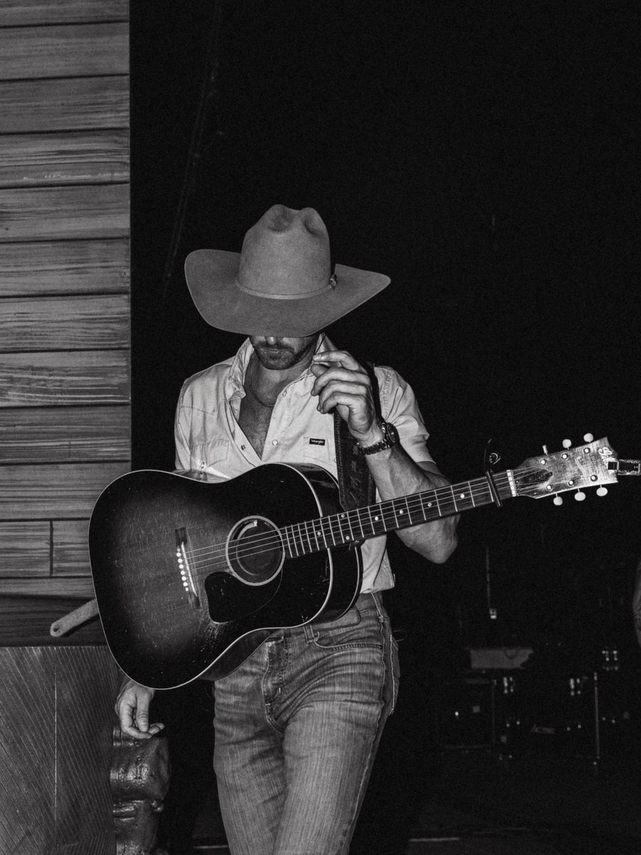 RileyGreen128's tweet photo. New album, sold out shows, doing work on thrift stores across the country and signing prosthetic limbs… it’s a hell of a time to be on the road playin country music. #weouthere #cowboyasitgetstour https://t.co/CEHxZUmTeM