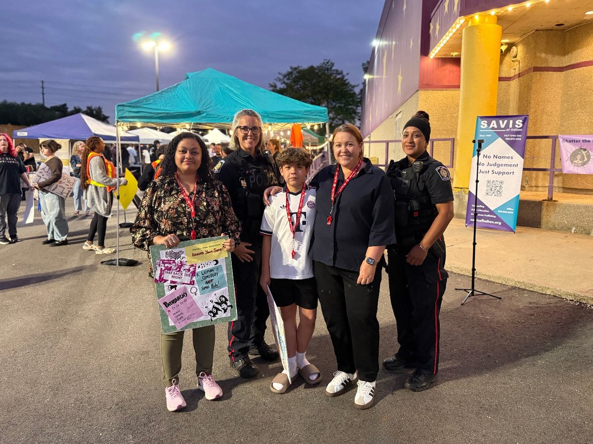 HRPS_Comm's tweet photo. Safer communities are built by listening, supporting survivors and standing against violence. Our 2 District CMB officers joined residents at SAVIS of Halton’s Take Back the Night march—strengthening partnerships and helping everyone feel heard and safe. #TakeBackTheNight https://t.co/LdpUtEld5Q