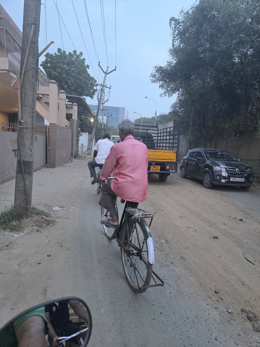 SudsG5's tweet photo. This is not a tier 2 or 3 town, this is not even some distant far flung suburb. 

This is Ambattur industrial estate, it generates employment for 200,000 people. Has an annual turn over of ₹  15,000 crore of which ₹ 3,500 cr is exports. 

It generates income taxes, CGST, SGST, excise and duties. It's support ecosystem (truckers, cleaners, security staff etc) must run into the 10's of thousands. 

It's also an emerging residential real estate hub. The avg per sq in a newer condo is ₹7,500 / 8,000. 

Yet it looks like a war torn dystopia. Has ZERO pavements though 10's of thousands of workers walk from railway stations / bus stops to their factori s and back. 

Large parts of it lack functioning street lights. 

Filthy open sewers, even spotted a few fat pigs in them, cattle, stray dogs, dust everywhere, garbage garbage garbage as far as the eye can see.