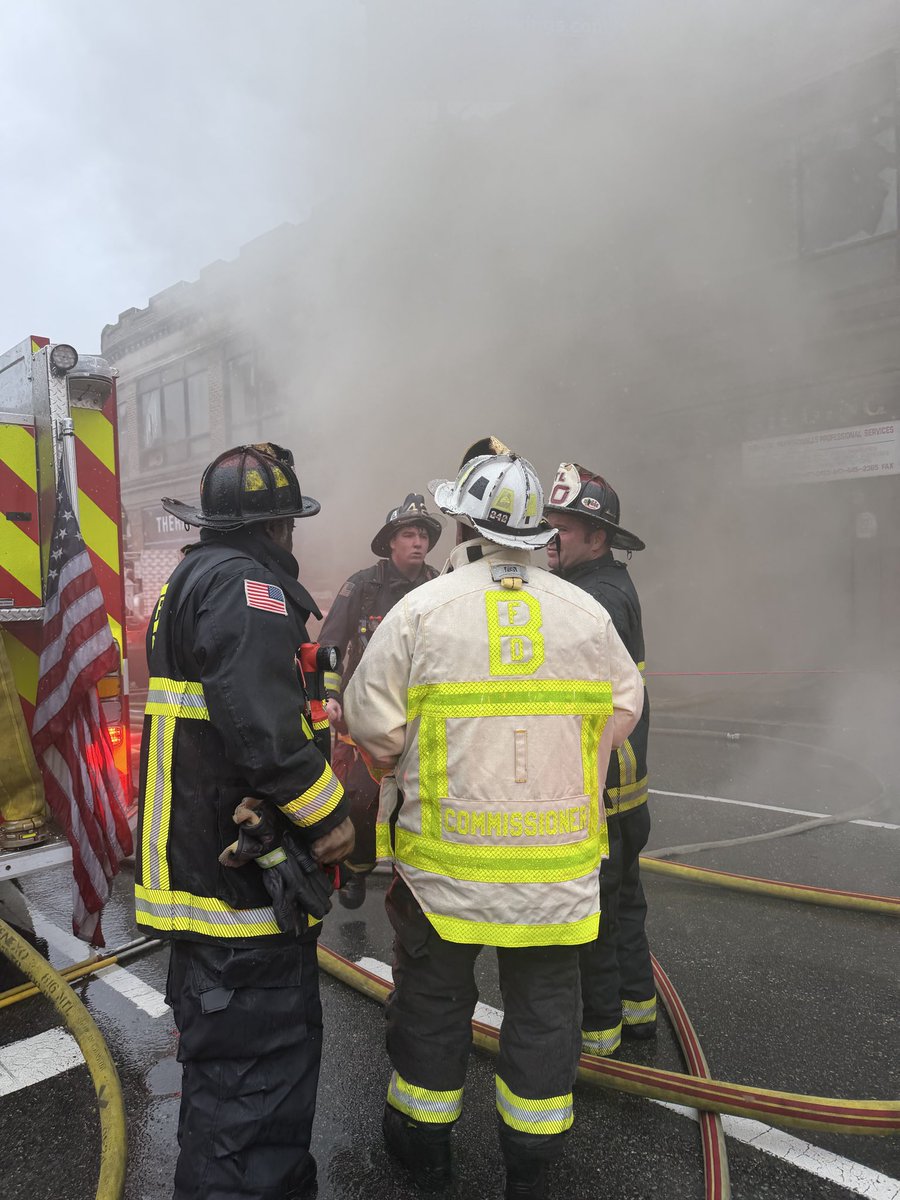 BostonFire's tweet photo. All fire companies are still working hard to keep water on the building . Engines are pulling water from as far as Moreland St, 2 blocks away. Please avoid Nubian Sq. area. Thousands of feet of feeder CC has most side streets blocked. https://t.co/Gs8iEi4uAN
