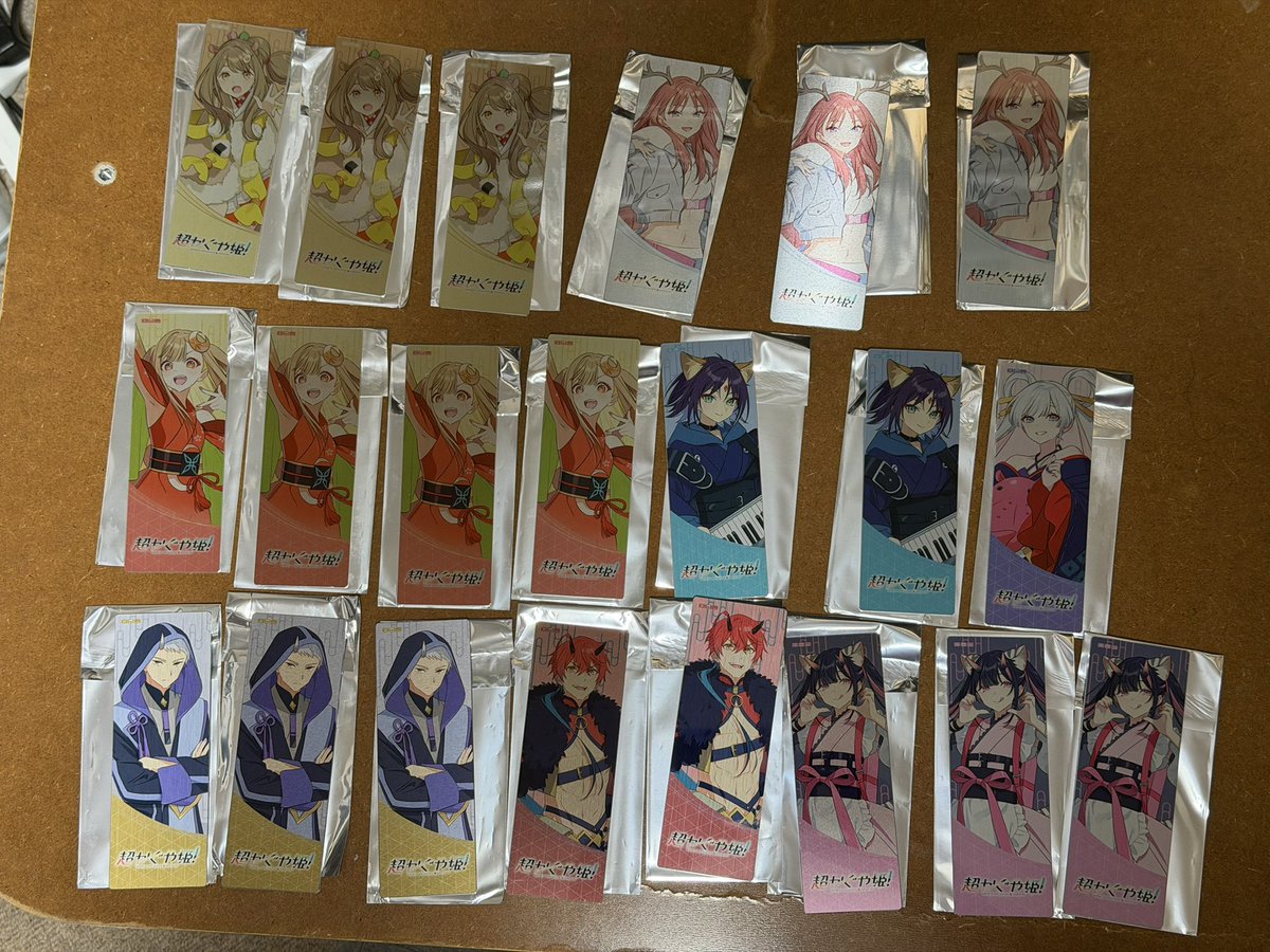 kokagex's tweet photo. HUBのメタルチケットこうやってみると、ヤチヨが少ないっていうだけでだいたい満遍なく出てる感じがしますね。色味の違いはさほど感じられない。額装したら映えそう。 https://t.co/1FdJfNzjR4