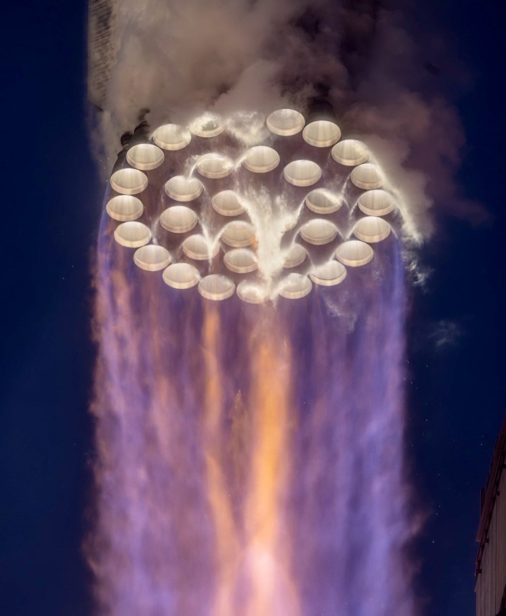 AJamesMcCarthy's tweet photo. I set a camera really close to the launch pad to get this shot. It was a sound activated trigger since it wasn’t safe for me to stand here. 

That’s all 33 Raptor engines performing nominally as Starship heads to orbit for the first time. https://t.co/qNK27lk6WQ
