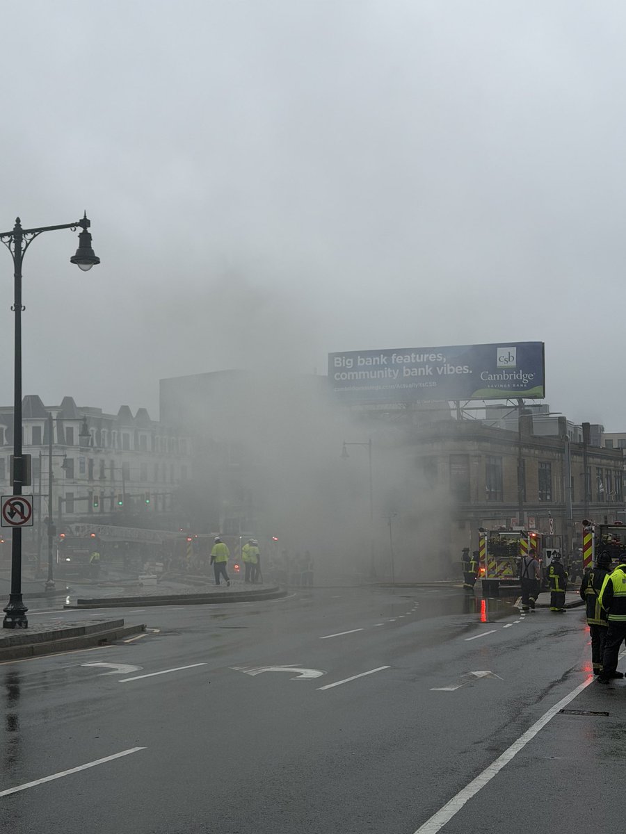 BostonFire's tweet photo. Fire companies have started to rotate out &amp; get rehabbed. Traffic is still impassable due to large feeder lines that run from hydrant to engines. The fire has been knocked down to being just in the basement level which continues to push out significant dark smoke. https://t.co/3kjo3yDgOo