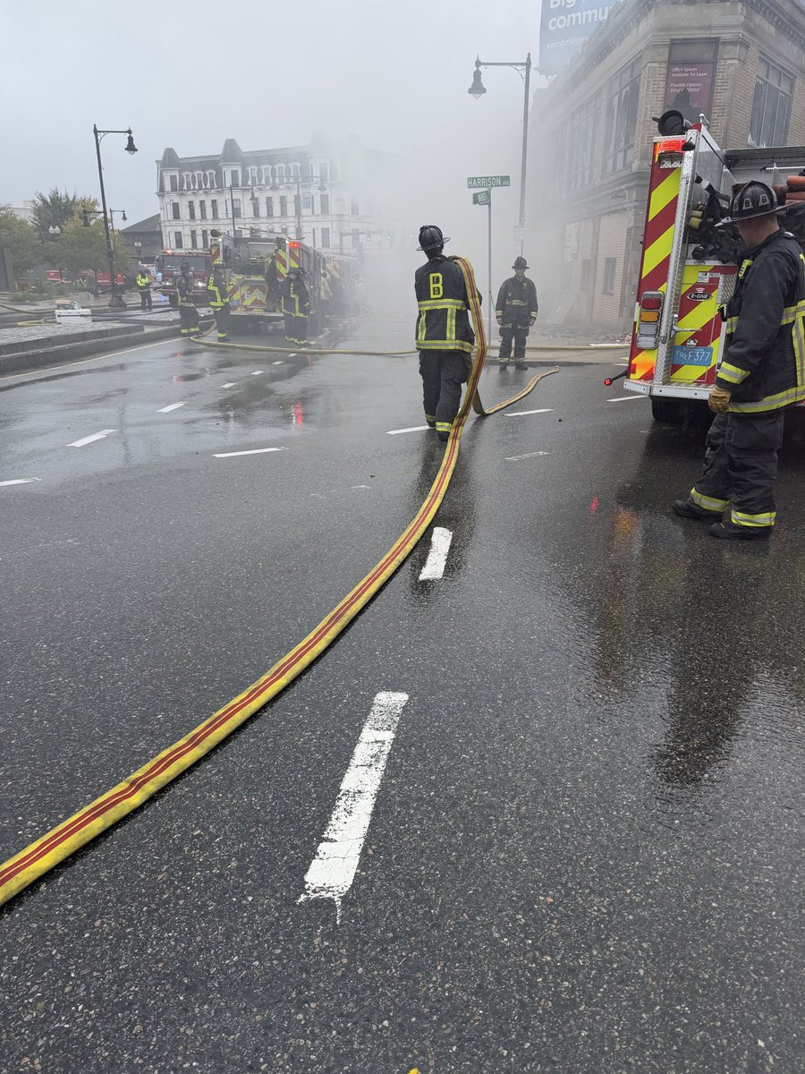 BostonFire's tweet photo. Fire companies have started to rotate out &amp; get rehabbed. Traffic is still impassable due to large feeder lines that run from hydrant to engines. The fire has been knocked down to being just in the basement level which continues to push out significant dark smoke. https://t.co/3kjo3yDgOo