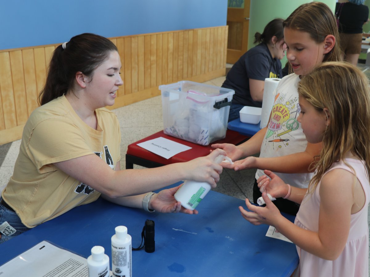 IowaMed's tweet photo. Our medical students traded their classrooms for the @FamilyMuseum in Bettendorf! 🩺

At the museum’s Doctors in Training: STEAM Night, our student volunteers helped young visitors get a hands-on look at medicine through different activities, like trying on white coats.

We love seeing our students share their passion for medicine and inspire the next generation of health care professionals!