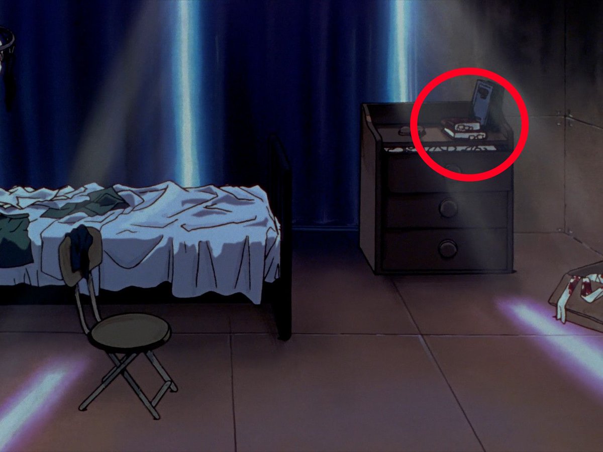 EvangelionShots's tweet photo. Rei Ayanami apparently spends part of her free time reading medical books.

According to the official Episode 5 commentary, the books kept on the chest in her apartment cover subjects such as psychology and genetics.

The production notes even specify that Rei reads them intently, with tags marking pages throughout the books.

It’s a tiny piece of characterization that’s barely communicated directly in the series.
