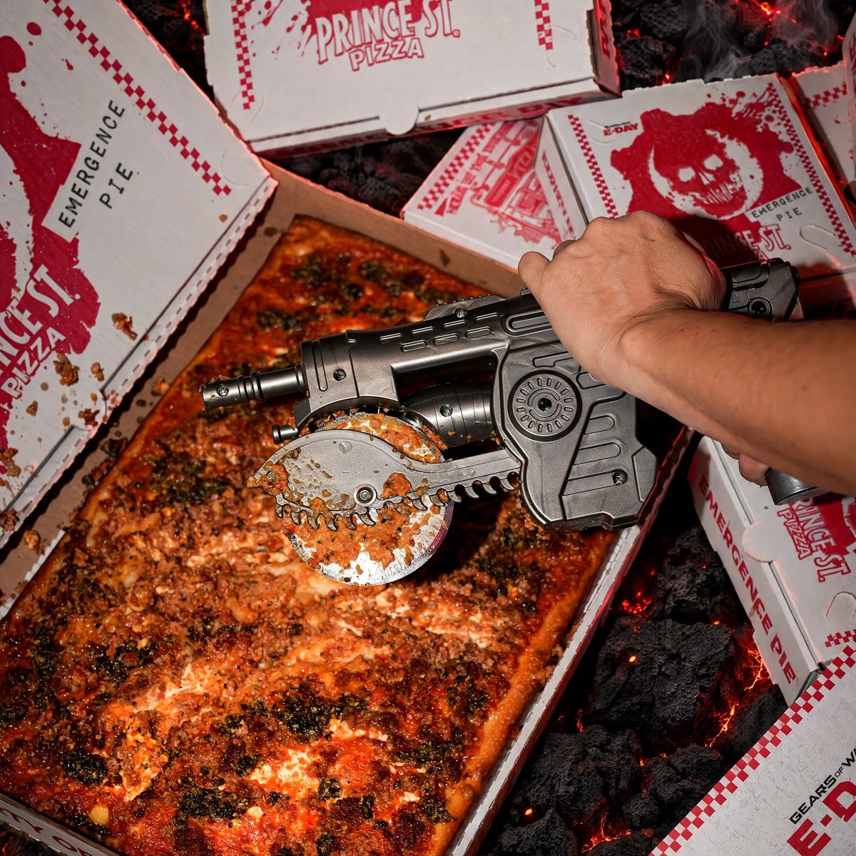 Wario64's tweet photo. Limited Edition Gears of War Prototype Lancer Pizza Cutter up for order at Prince St. Pizza ($60) https://t.co/vBcFBcQ6Hz https://t.co/L5vdHq6l4G