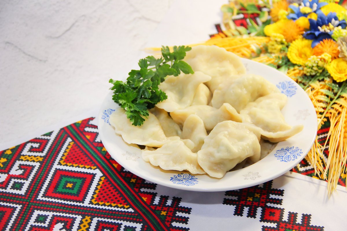 Canada's tweet photo. From Ukrainian kitchens to Canadian dinner tables, varenyky, or, perogies tell a story of food, culture and connection between our communities, passed from one generation to the next, and continually renewed. Share your favourite way to enjoy it. 🥟🇨🇦🇺🇦 https://t.co/pn7GEg5YN3