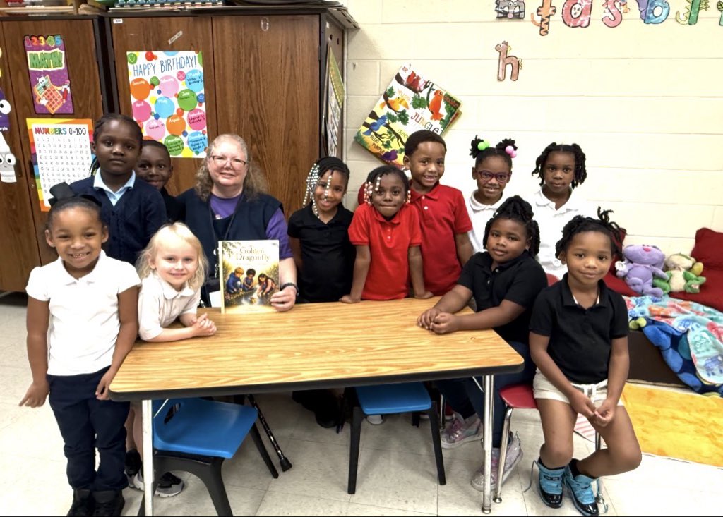 ArlingtonJmcss's tweet photo. Kindergartners are thankful for their Foster Grandparent ’Granny Angela’! Scholars were excited to learn her sister wrote a book & donated a copy to everyone in Mrs Brown & Mrs Fowler’s classes. @DrShemon @JMCSchools @suptking #ReadingIsFun #SouthwestHumanResourceAgency https://t.co/HhrnnIJgUQ