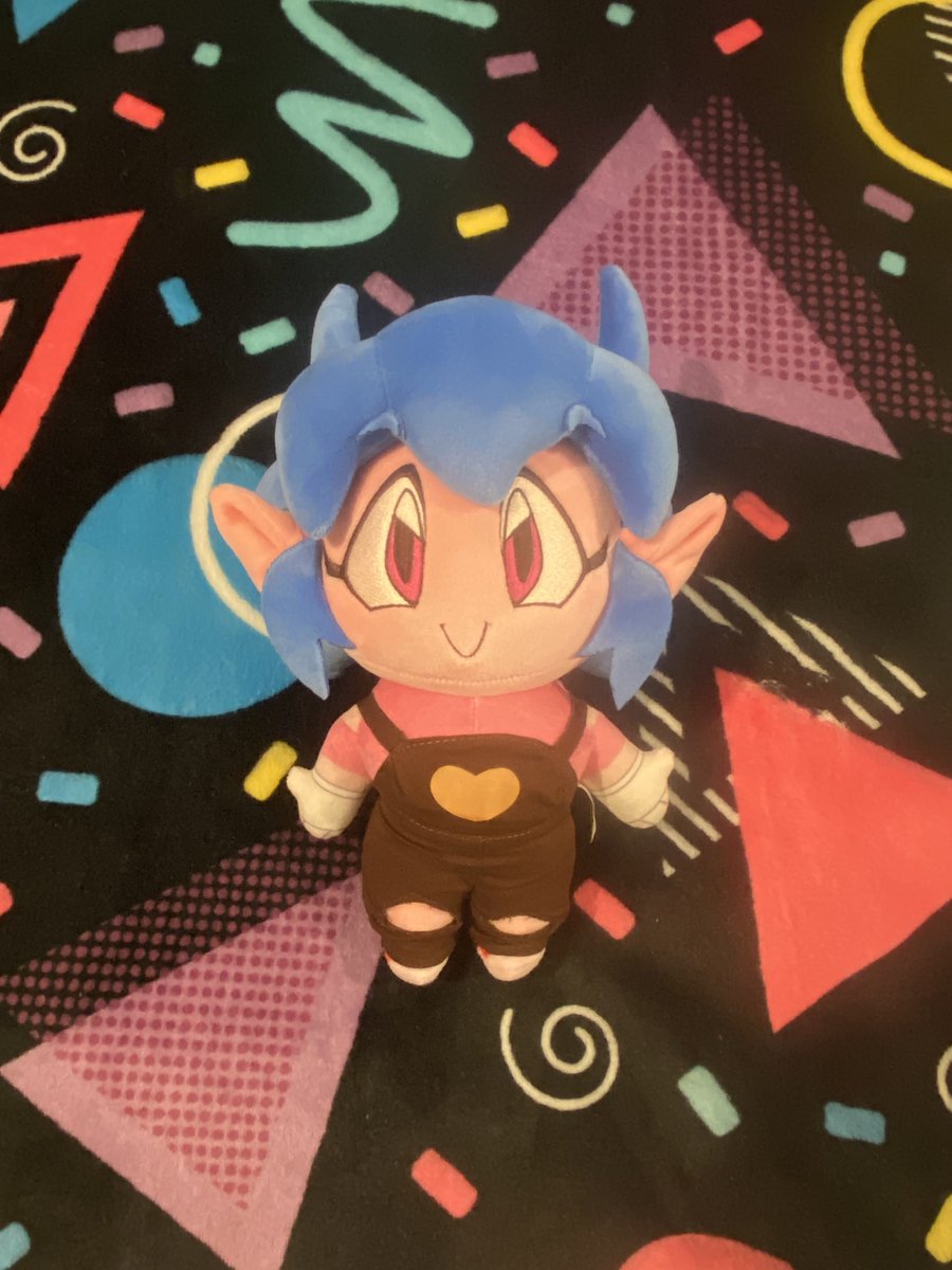 TOX90S's tweet photo. I'm late so here's my very own Emi soft toy.
I never thought I would get this sassy, cute, demon in plushie form. Yayy. 
She's lying on my bed so she can relax. Maybe too relaxed. :3

Emi © @TheTwistedGrim 
Plushie made by @craftifyxco https://t.co/77bWQvH1fk