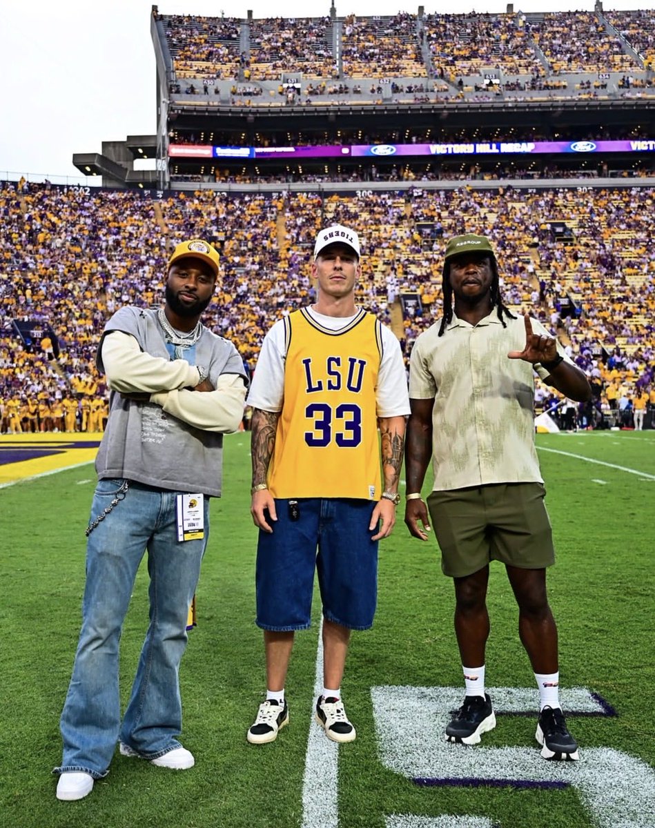 LSULClub's tweet photo. LEGENDS in the building 🔥

Jarvis Landry, Brad Wing &amp; Early Doucet served as guest captains for #LSU’s game against Texas A&amp;M! https://t.co/Spf1vNmwjc
