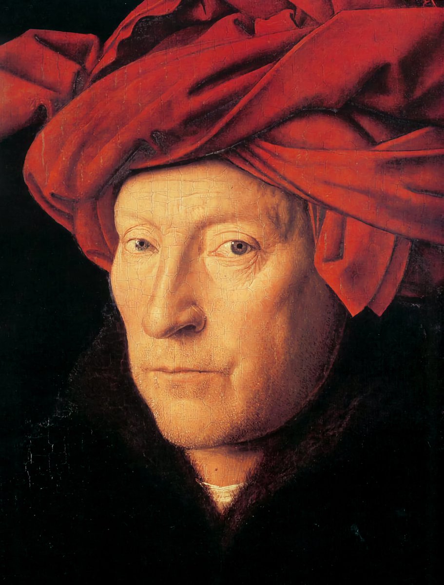 xmuse_'s tweet photo. This portrait is so underrated. 

Jan van Eyck painted it back in 1433. 

Everyone calls it Man in a Turban, but it’s actually not a turban at all. It’s a chaperon, and he just has the long tail wrapped up so it wouldn't get in his way while he was working.

Just look at that stare. 

That’s exactly why so many people think this is a self-portrait. If you look closely, the eyes don't quite match. It really looks like he painted one, and then the other, just focusing on each one individually.

He even wrote his motto on the original frame in Greek letters: 

"Als Ich Can"—which means "as I can." It's basically a pun on his own name. As Eyck can.