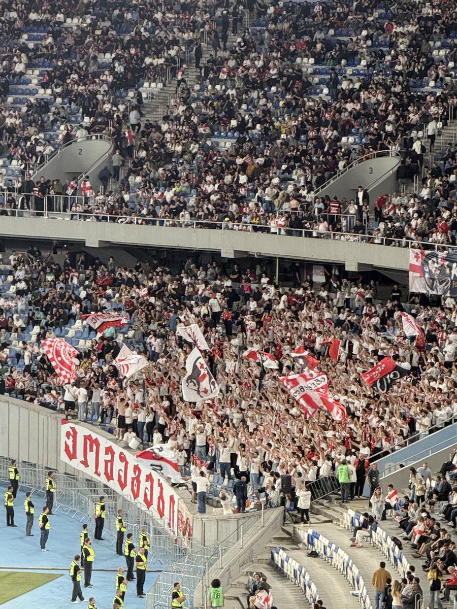DaveHarrisonGo's tweet photo. Georgia v Ukraine. A pretty average game, but a good atmosphere. Both nations clapping each others’ national anthems &amp; later ringing out “Putin Khuylo” (Putin Dickhead) regularly. At one point the Georgian ultras were chanting Ukraine, as Ukraine’s shouted Georgia. https://t.co/qA4tNRPGhK