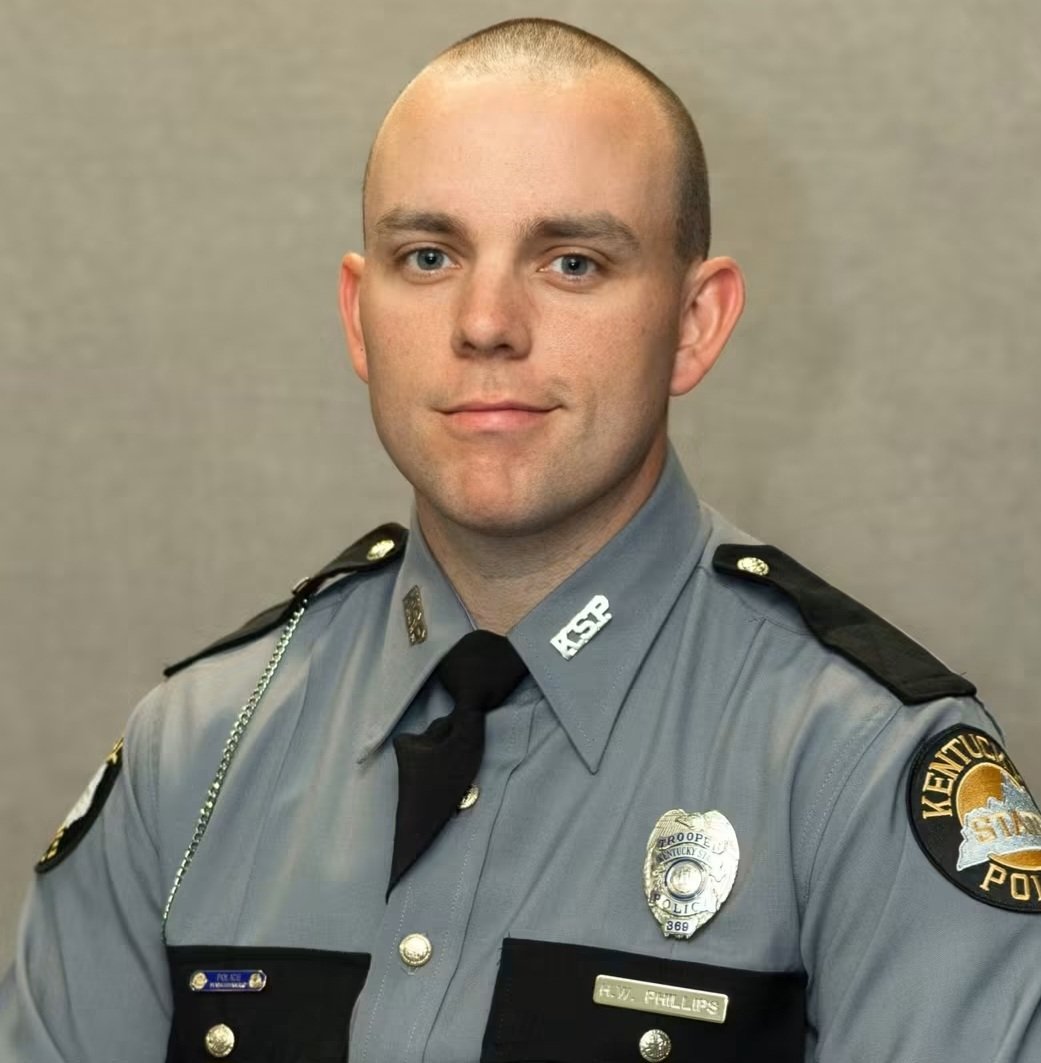 RealBookerScott's tweet photo. Kentucky State Police Trooper, Hayden Phillips was shot and killed Monday in Warren County (Bowling Green) while patrolling I-65. Suspect, Emonnie Branch, is still on the run.

RIP https://t.co/8mxacyrFsd