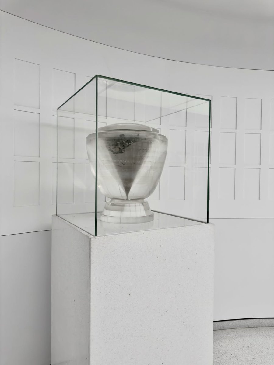 AuschwitzMuseum's tweet photo. An urn containing human ashes is displayed in Block 9 of the new main exhibition at the Auschwitz Memorial.

It is surrounded by empty frames that symbolize the victims of the camp whose faces we do not know, and whose identities may never be recovered.

The empty frame reminds us that behind the number of 1,1 million victims were individual people, each with a name, a face, a life, and a story brutally cut short.

Watch a short video of the exhibition: https://t.co/dDF8WxYK7S
---

Photo: https://t.co/4lrW2w8eI2