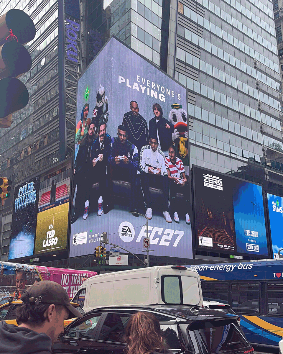 EA's tweet photo. Everyone’s playing The World’s Game, even in Times Square 😮‍💨 https://t.co/KA5nOus1lx