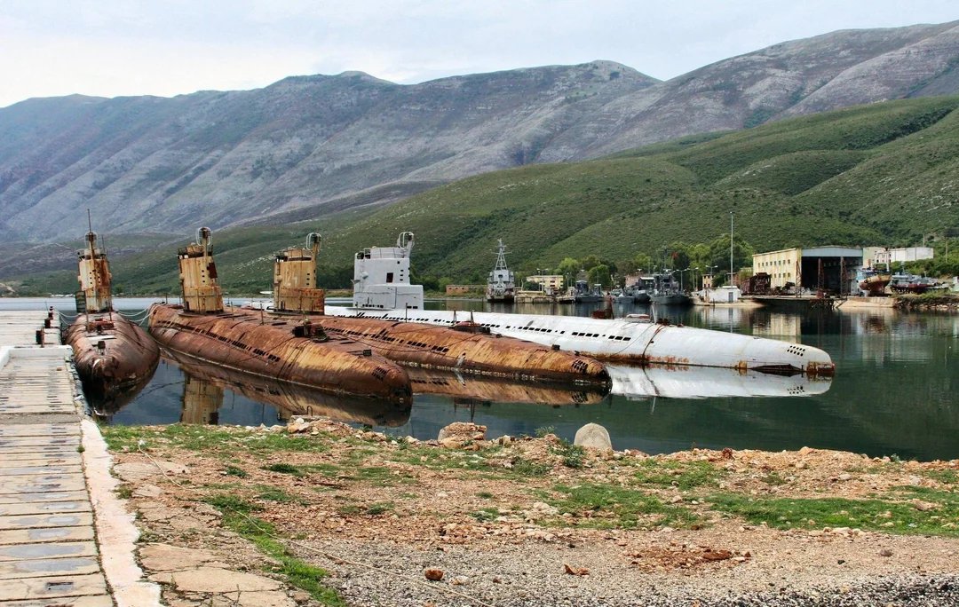 HiddenHistoryYT's tweet photo. Soviet made Whiskey Class submarines left abandoned in Albania after the break up of the Soviet Union. https://t.co/4MXeqTuBEj