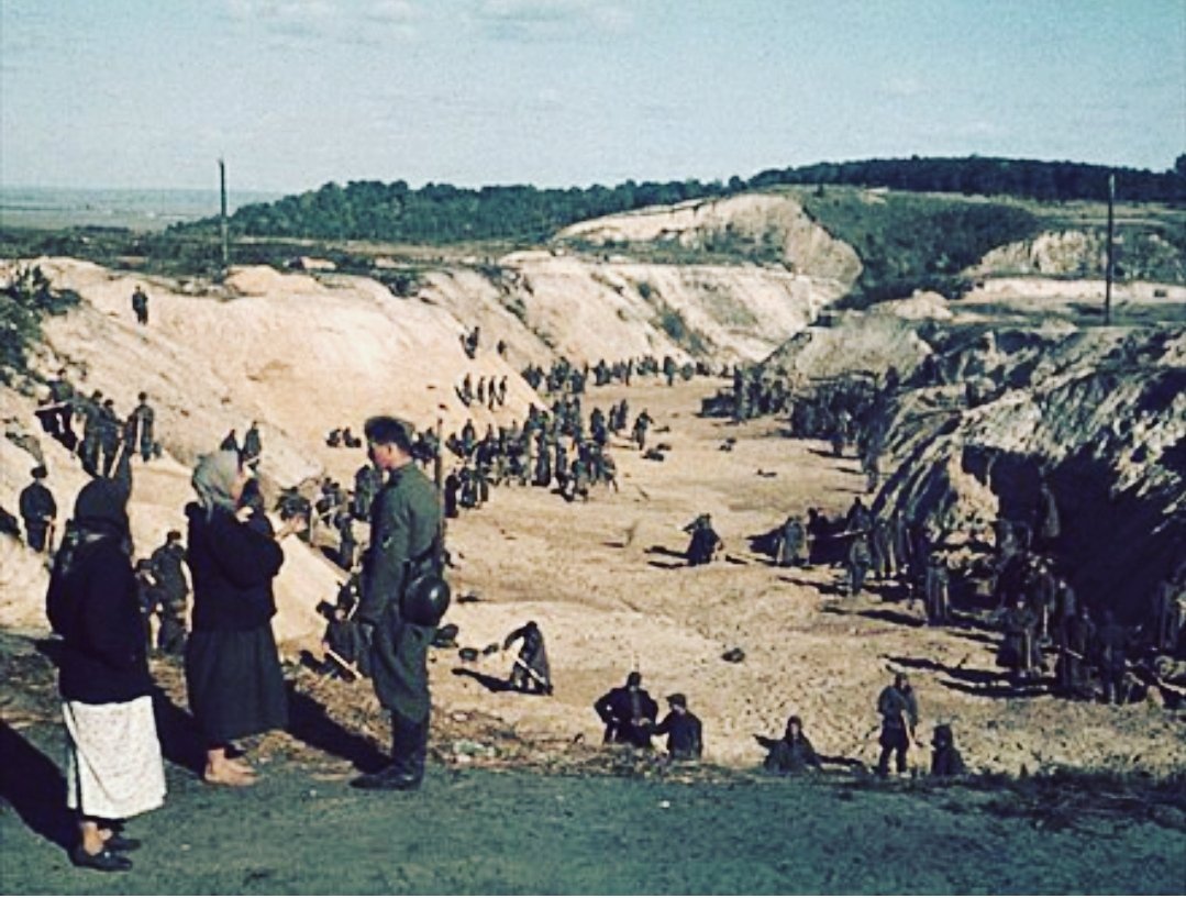 RabbiPoupko's tweet photo. Today and tomorrow mark the 85th anniversary of the massacre in Babi Yar.

While many are familiar with the horrors that took place in Auschwitz, Treblinka, Bergen Belsen, Dachau, and other more Western European cities where Germany and their assistants carried out the horrors of the Holocaust, not too many know about the Holocaust by bullets that took place in Eastern Europe. 

On September 28 th 1941 Germans and their local Ukrainian collaborators posted notes throughout Kyiv and the surrounding area demanding that Jews show up with all of their belongings in the area of Babi Yar outside Kyiv.

The following day, on the eve of Yom Kippur, tens of thousands of Jews were marched to Babi Yar. 

Over September 29–30, 33,771 Jews were murdered in cold blood by German forces, assisted by local Ukrainian collaborators.

One of the senior German commanders, Commander of Einzetzgroupen C, was known as "Dr. Dr. Otto Rasch"because of the double doctorate he had in law, political economy and philosophy from the University of Leipzig.

Academia has yet to reckon with its role and complicity in the horrors of the Holocaust, a failure to learn that is reflecting in the proliferation of anti-semitism on campus today.

There is so much to see in this picture, yet to me the ultimate act of betrayal is seen in the soldier seeming to reassure the woman who does not even have shoes on, knowing full well what he is about to inflict on her and our people. 

We will never forget 🕯️🕯️🕯️🕯️🕯️🕯️