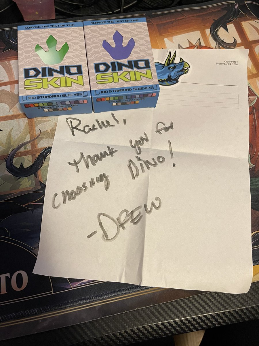 yestrdays2morow's tweet photo. Sleeves from @DinoSkinGames just came in!! Already sleeving my deck up and they’re NICE. Also, always gotta love a new sticker! https://t.co/RHhcVu6yWQ
