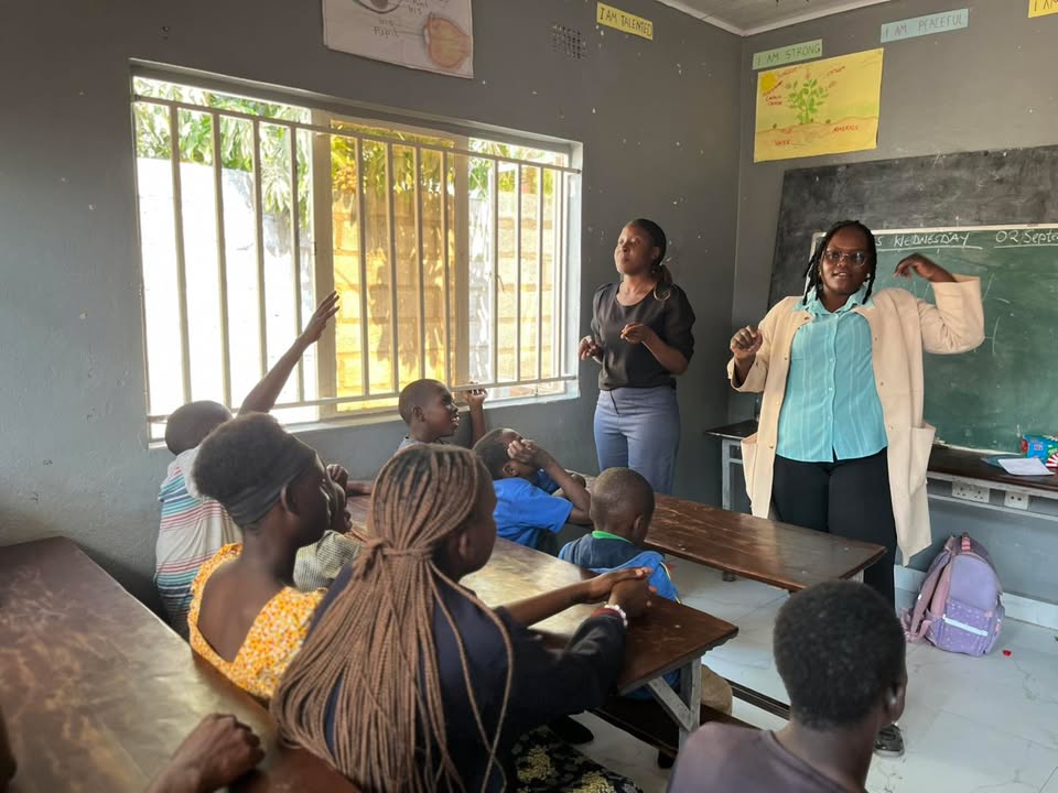 AEProgram's tweet photo. At the African Education Program, we believe unlocking potential starts from the inside out. That's why emotional well-being is woven into every program at our flagship Learning & Leadership Center in Kafue, Zambia — the Amos Youth Centre (AYC)!

Recently, Rebecca Tembo, AYC's Project Coordinator, led a mental health session with students in the Read for Rose Special Education Program. Together, they explored their "inside" and "outside" emotions: what we feel within, and how we express those feelings to the world around us.

Sessions like this help students recognize and name their emotions, build confidence in sharing them, and understand that caring for our mental health matters for everyone.

Read for Rose serves 41 children with disabilities, and each one has an individualized learning plan built around their unique abilities. Safe spaces where students feel seen and heard are as essential to that plan as reading, writing, and sign language. This is how we nurture changemakers.

💛 $900 provides one year of learning for a Read for Rose student, including sessions like this one. Support a student today: https://t.co/Q0Z1G9Ghpl

#MentalHealthMatters #InclusiveEducation #EducationForAll #ReadForRose #CommunityLedChange #Zambia