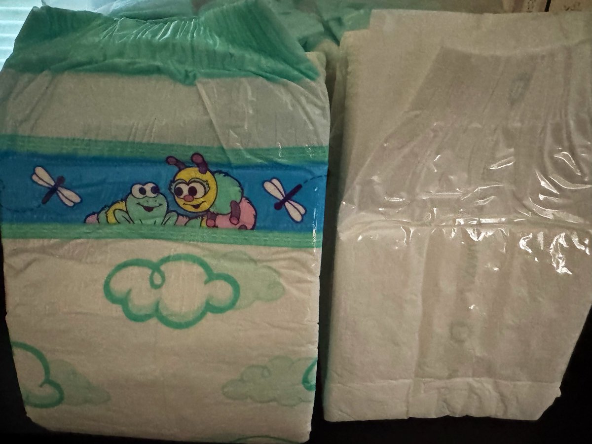 Realworldbriefs's tweet photo. Kiddo Premium Night Plastic XL vs NorthShore MegaMax Large.

Same person. Dual incontinence. Side sleeper. Wife is the caregiver and helps when I change.

MegaMax L is still the daily driver. Kiddo XL sits higher and the plastic stretches less. 

Tapes on the Kiddo are strong—thick panel, they stay put.
MegaMax has only leaked on me when it was flooded.

 Kiddo has leaked on my side at night. Standing guards on the Kiddo have held for bowel so far.

Kiddo is loud and crinkly under loose clothes. Once wet, it feels a bit more comfortable than MegaMax. 

Under jeans it actually hides a little better, even in the larger size.

Wear time is the same. That’s her check schedule, not a bag claim.
Kiddo Plastic XL: 4/5. Performance is close to MegaMax. 

The cut is availability—few U.S. suppliers.

Cloth-backed Kiddo Premium Night: more comfortable than the plastic version if noise and stretch matter more than PE.

Print is there. Home and family preference. I scored the brief.
If you wear either, what failed first—side sleep, tapes, heat, or bulk?

#Incontinence #AdultBriefs #NorthShoreMegaMax #ProductReview #DisabledVeteran
 #diaper