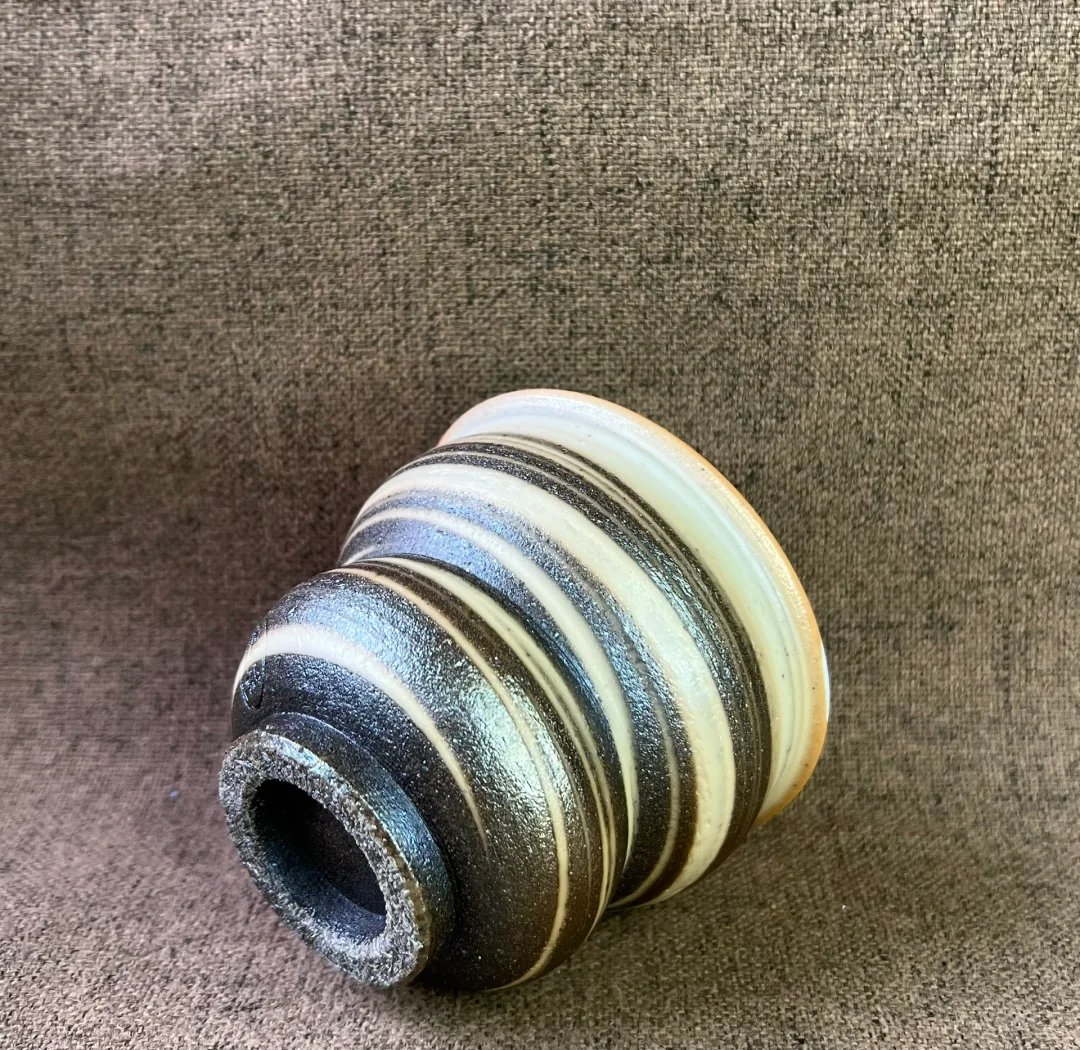 DahliaKampkb7p's tweet photo. Just finished my first hand-thrown ceramic mug! The rough clay texture and sun glazing make every sip feel like a little win. Handmade = heart-made https://t.co/1BfeVpnWju