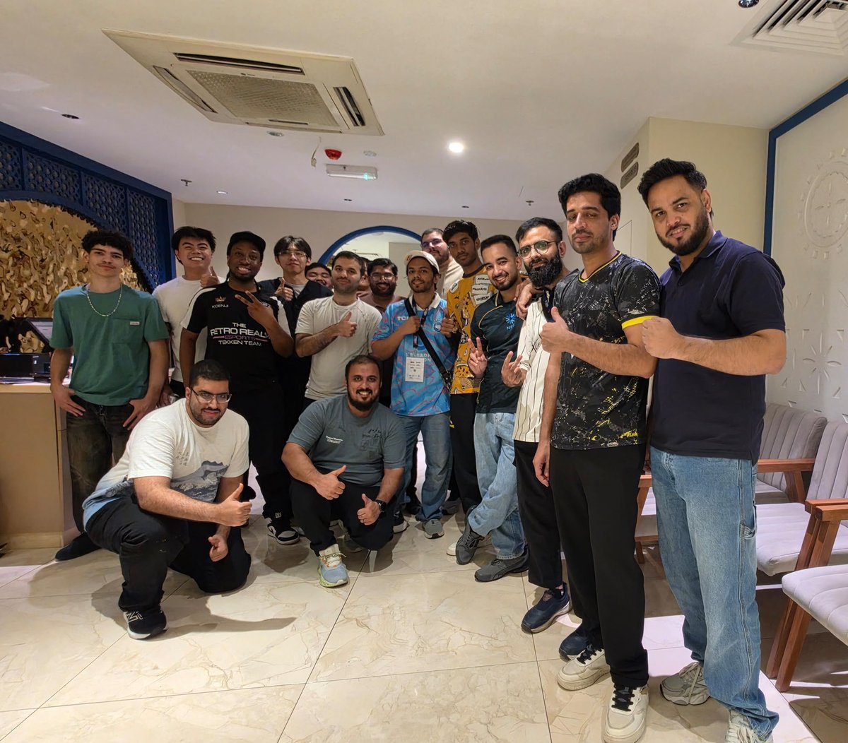 koenjideck's tweet photo. Writing this on the plane (thanks Starlink)

4 days ago I competed in Virtuocity Battleground located in Qatar, my first tournament ever outside of the UK and I ended up coming 17th.

Although the placement wasn't what I was hoping for, I learned A LOT; especially in terms of what works and what doesn't against strong players outside the EU.

But I will say, the time I spent after the tournament with the local players and talent from Pakistan was the highlight for me. 

From experiencing middle eastern munches to taking pictures at Al Corniche and enjoying IHOP pancakes with the lads before my flight (we have zero IHOP's in the UK), these are memories I will never forget.

Thank you to all the members within the Qatari scene that made this short stay very special, I want to especially give my flowers to @Faisal_FGC for being an excellent host and introducing me to the scene properly, To Ian, Audrey, Gabby and Jassim for the good matches played at the event, @RedOdeste23 for being the funniest guy at all times and @salmanA36, who is one of Qatar's strongest players who I played a number of matches with offline and online as he was showing up in my ranked queue a couple hours before my flight.

And of course good games to @Farzeen_tk in winners side and @tekken_masterbh who eliminated me in bracket.

This trip really opened my eyes more to using Tekken as an avenue to seeing the world. I will go to more places and countries and it definitely won't be my last trip to Qatar.

On that note, next stop is Evo France! 🇫🇷