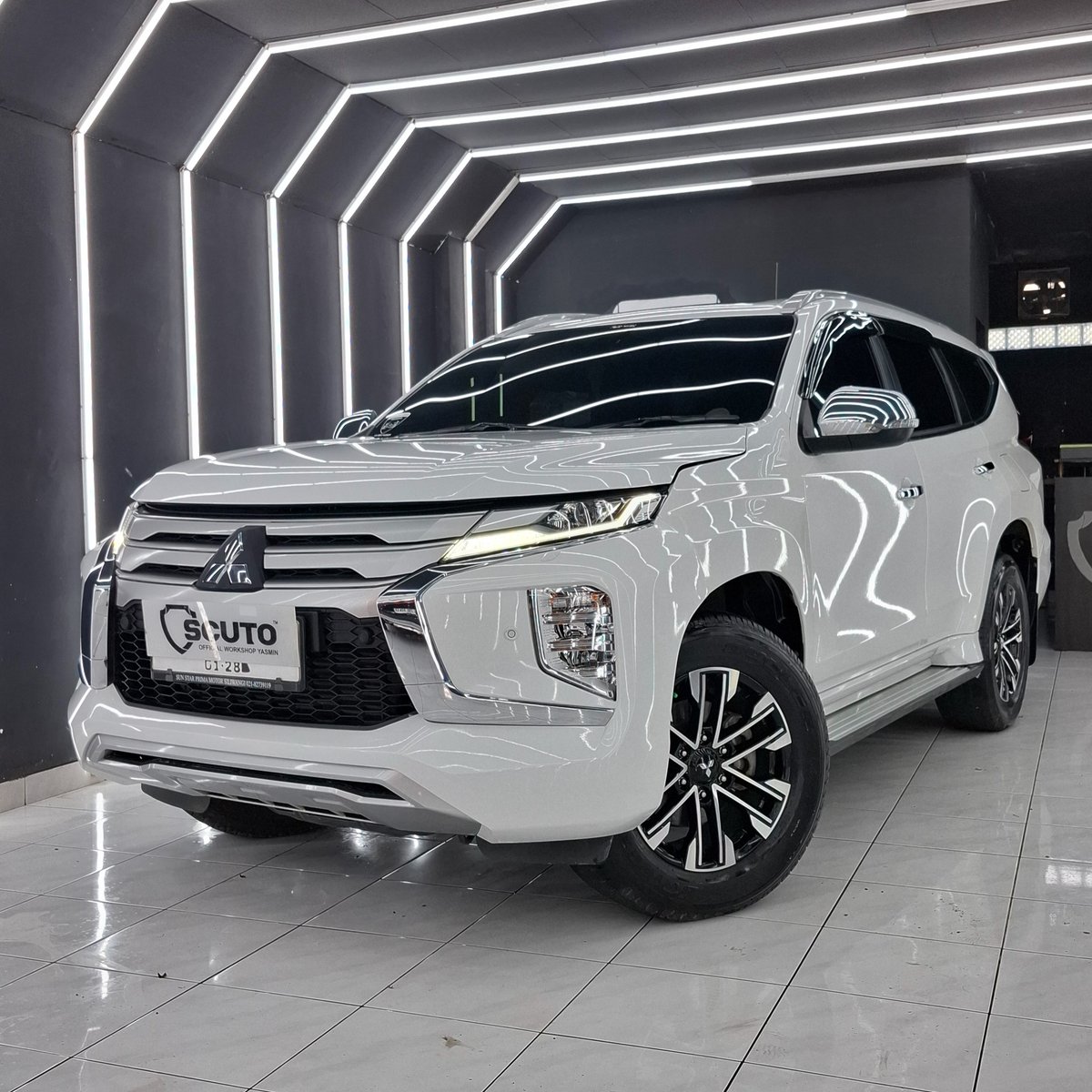 DerenSay's tweet photo. Mitsubishi Pajero Sport with Scuto Yasmin Platinum Nano Ceramic Coating. Longer-lasting gloss, wet-look finish, hydrophobic protection, and defense against fading, yellowing, and extreme weather. Book now at Scuto Yasmin, Bogor. https://t.co/4Zxafax9ud
