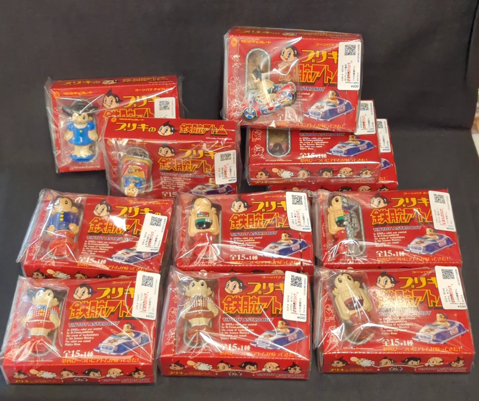明治 ブリキの鉄腕アトム コーンパフ チョコレート まんだらけ中野店こんぺいとう on X: 