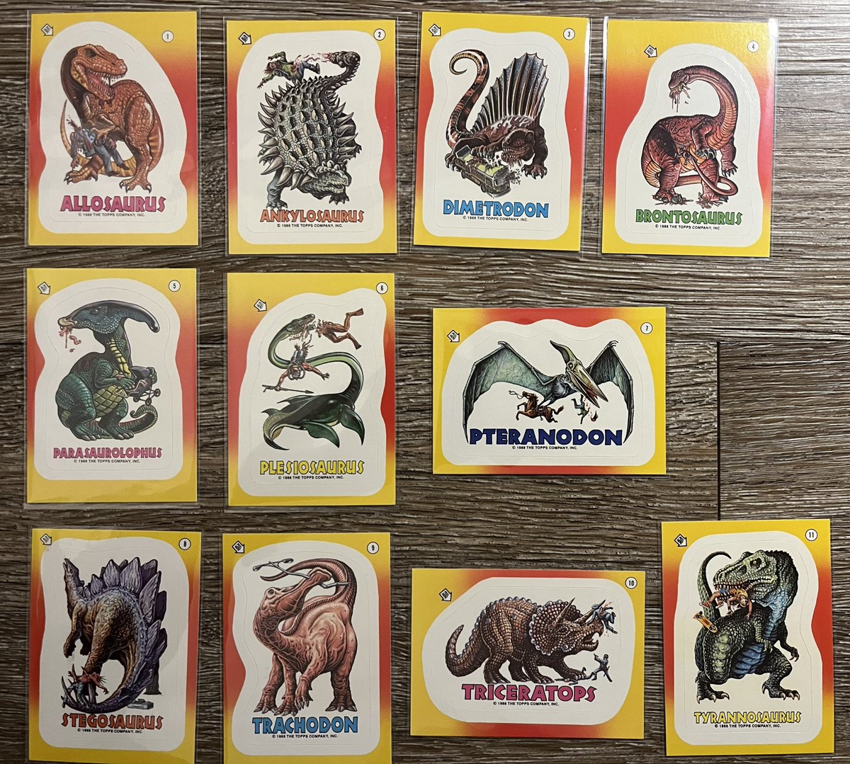RetroFox8Bit's tweet photo. On the subject of my card collections, Dinosaurs Attack is probably my favorite. I believe it's meant to be a spoof on the Mars Attacks cards and they did not pull punches on the gory art, lol. The backs have neat themes to tell the story. It's a weird and wacky set to be sure. https://t.co/ihAUPvfjVA