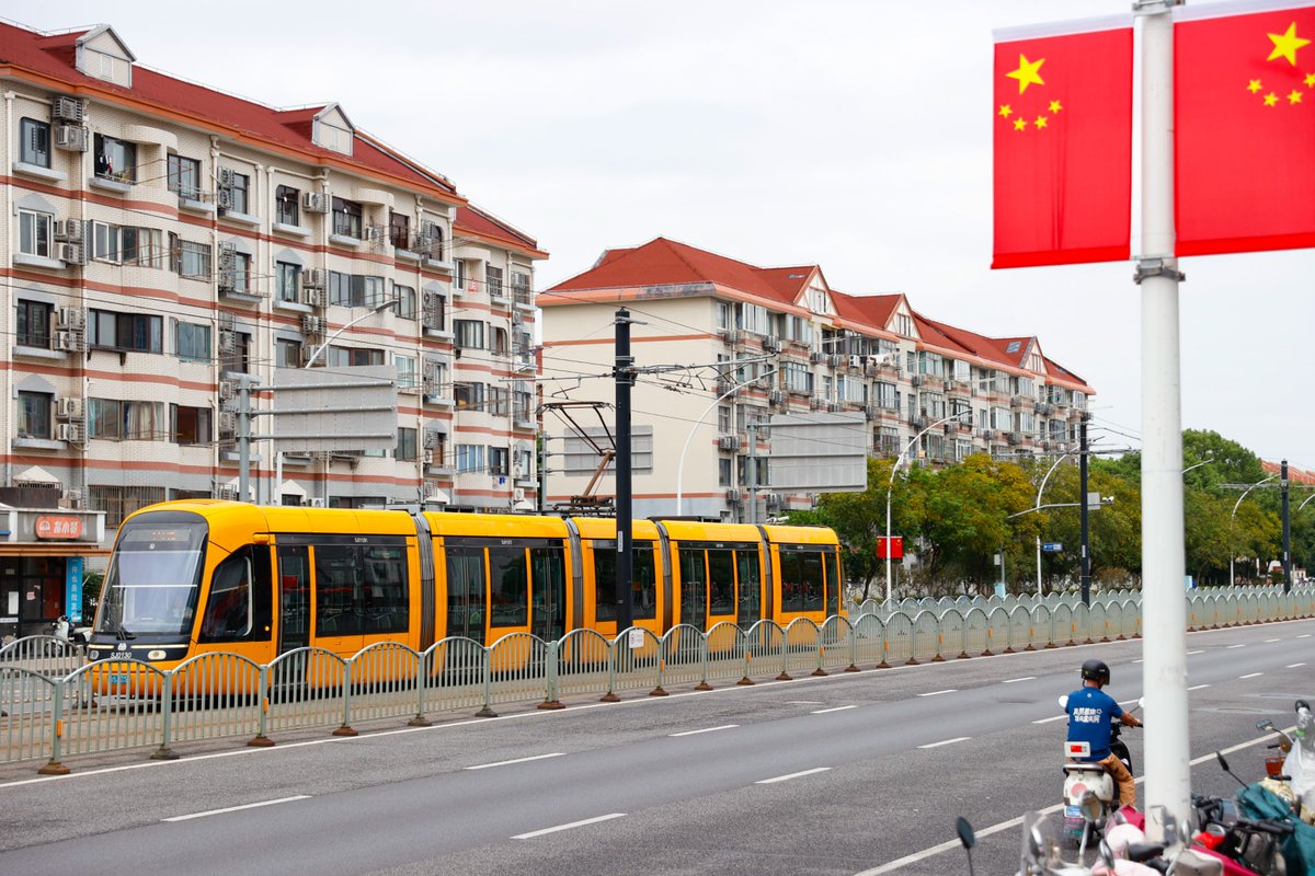 GoSongjiang's tweet photo. #NationalDay vibes are fully on in #Songjiang! Red flags wave proudly by the roads, glowing red lanterns hang above the streets. The entire city is draped in vibrant "#ChineseRed", brimming with joy to welcome our National Day! https://t.co/vobnQzSiZ3