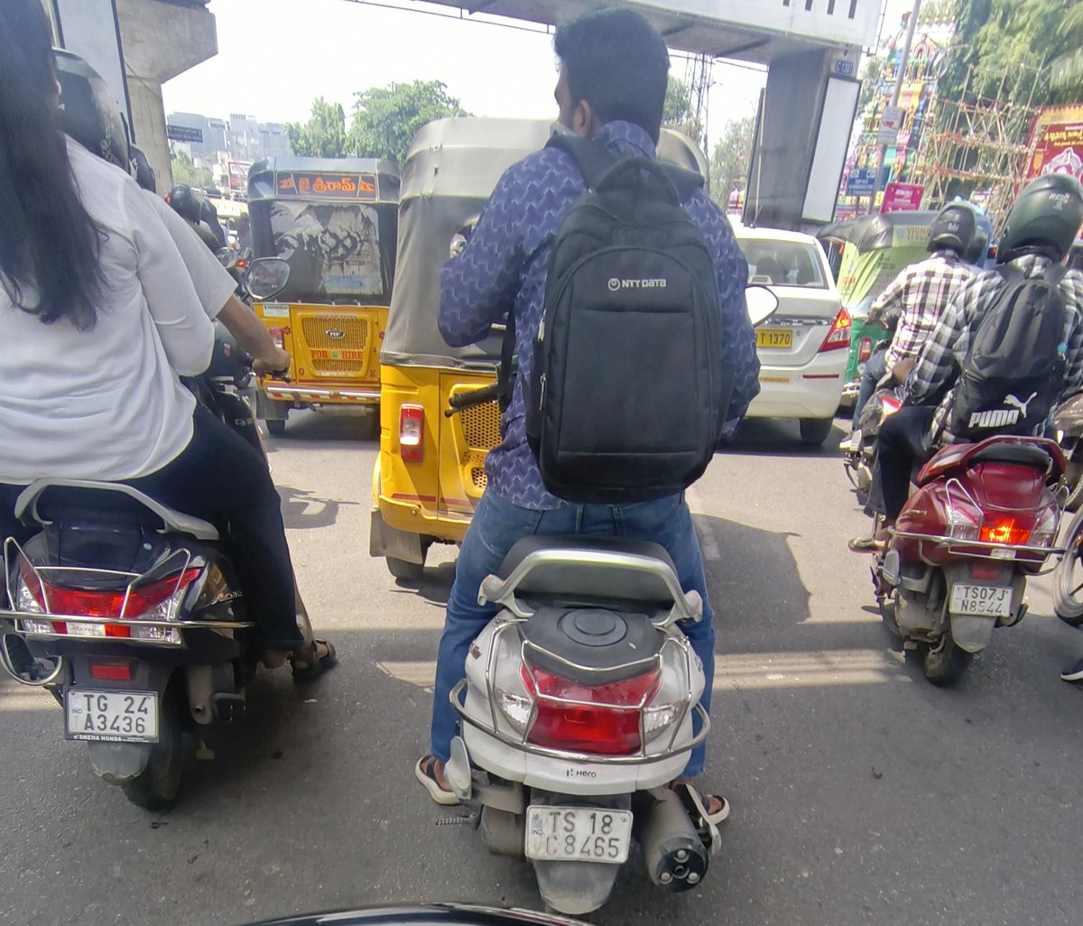 Saikumar909's tweet photo. .@HYDTP @AddlCPTrHyd

For necessary action

TS18C8465

1. Cellphone driving
2. Without helmet

28.9.26
10:49 am
Begumpet Flyover https://t.co/T5yWQhYTV0