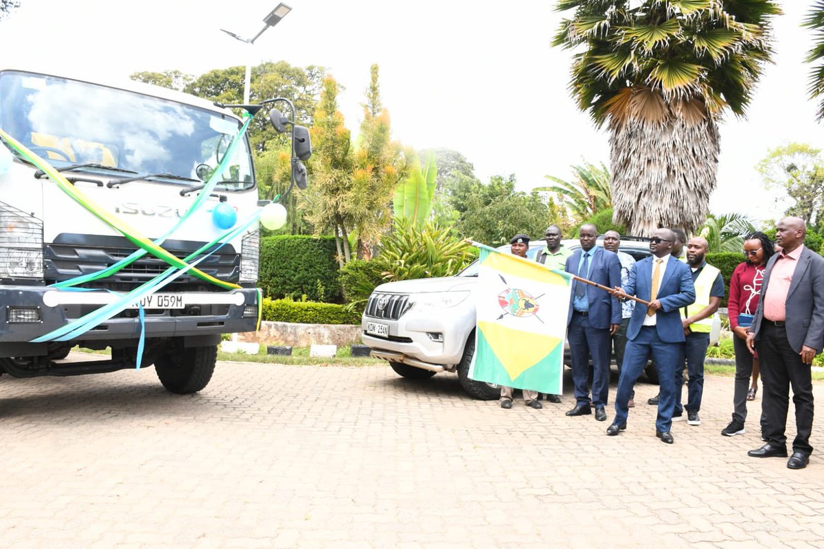 WPCGovernment's tweet photo. H.E. Deputy Governor Robert Komolle today flagged off a new exhauster truck donated by @CentralRiftWWDA to KAWASES to scale up county waste management and sanitation services. https://t.co/cQU1sLnRxF